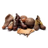 Leather football equipment, early to mid-20th century, comprising three pairs of leather football