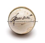 Shane Warne signed white one-day cricket ball, signed in black marker pen