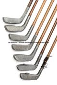 Group of seven aluminium headed putters, mostly Standard Golf Company of Sunderland, one bearing a