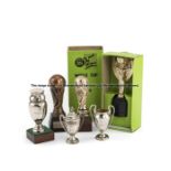 Six replica football trophies, comprising of a Subbuteo World Cup c.1119, 12cm high, with the
