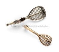 Two Tennis Racquet Brooches, comprising a small 9ct gold tennis racquet and ball brooch,