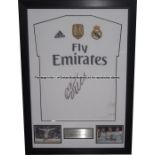 Framed Cristiano Ronaldo signed white Real Madrid replica home jersey, signed to front in black