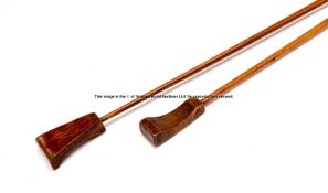 Two 19th century mahogany billiards maces, each with tapering shafts and block foots, lengths 108cm.