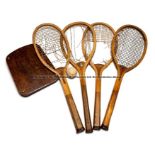 Four Edwardian wooden tennis racquets, comprising W. Mark Favourite racquet with original