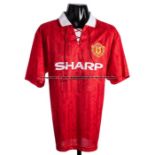 Eric Cantona signed Manchester United 1992-1994 style retro home jersey, signed to the front in