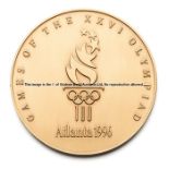 Atlanta 1996 Olympic Games participant's medal, bronze, 60mm., Games torch logo, the reverse with