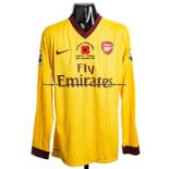 Johan Djourou Arsenal FC No.20 yellow Poppy jersey v Everton played at Goodison Park on 14th