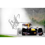 Six signed photographs of international Formula 1 Legends and World Champions in action,