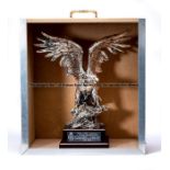 A WBA Continental trophy awarded to Panix Promotions in 1999, in the form a silvered eagle raised