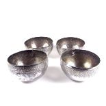 Four Islamic Malay silver bowls, Malaysia or Indonesia, 19th century.