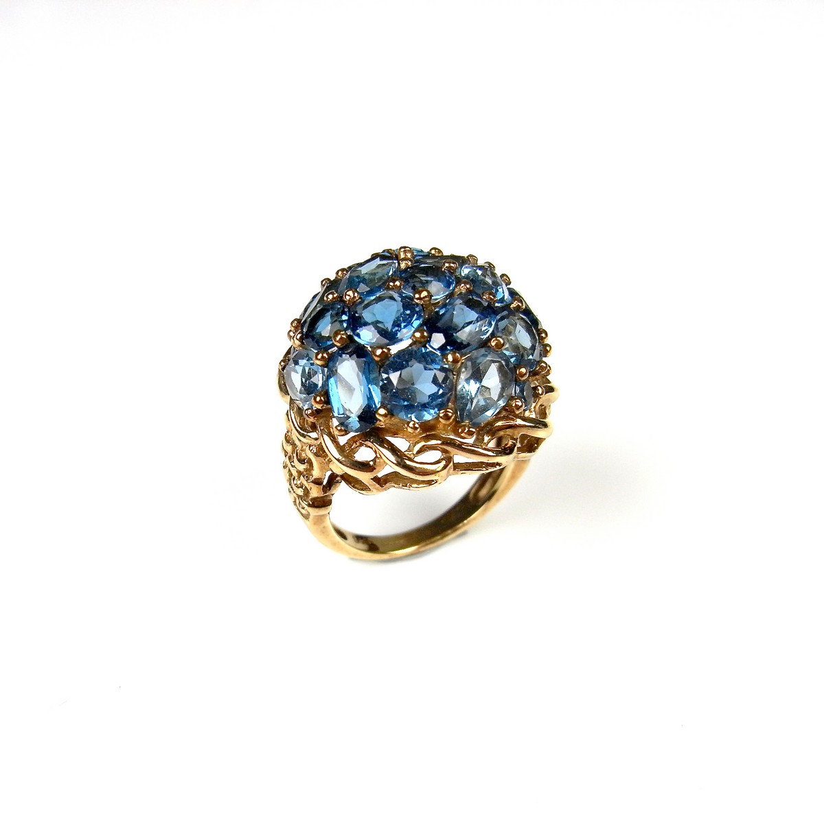 9 ct yellow gold blue topaz bombé style cluster ring.