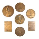 A collection of French bronze medallions and plaques, early 20th century.