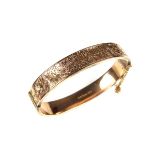 9 ct yellow gold bangle.