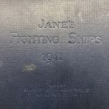 Two books entitled 'Janes's Fighting Ships', dated 1932 and 1942.