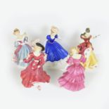 A group of five Royal Doulton porcelain figurines, late 20th century.