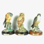 A group of three Royal Doulton ceramic figures of birds, late 20th century.