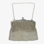 A ladies silver chain mail evening clutch bag.