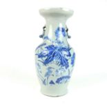 A Chinese celadon ground vase with blue and white decoration, 19th century.