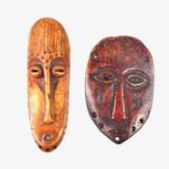 Tribal Art: Two miniature African carved bone and ivory face masks, Lega tribe, Kongo.