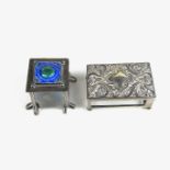 A Victorian silver match box holder and a miniature Arts & Crafts box.