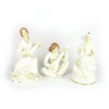 A group of three Royal Doulton porcelain 'Enchantment Collection' figurines, circa 1983.