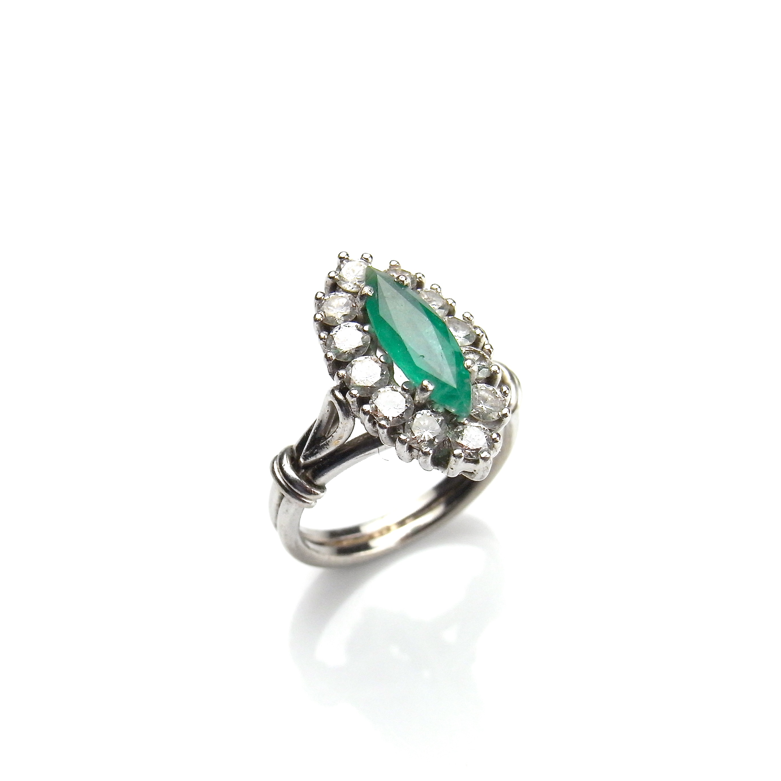 White gold emerald and diamond marquise ring.