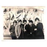 The Rolling Stones: A large photograph signed by five members of the band, circa 1963.