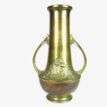 An Art Nouveau brass twin handled vase, early 20th century.