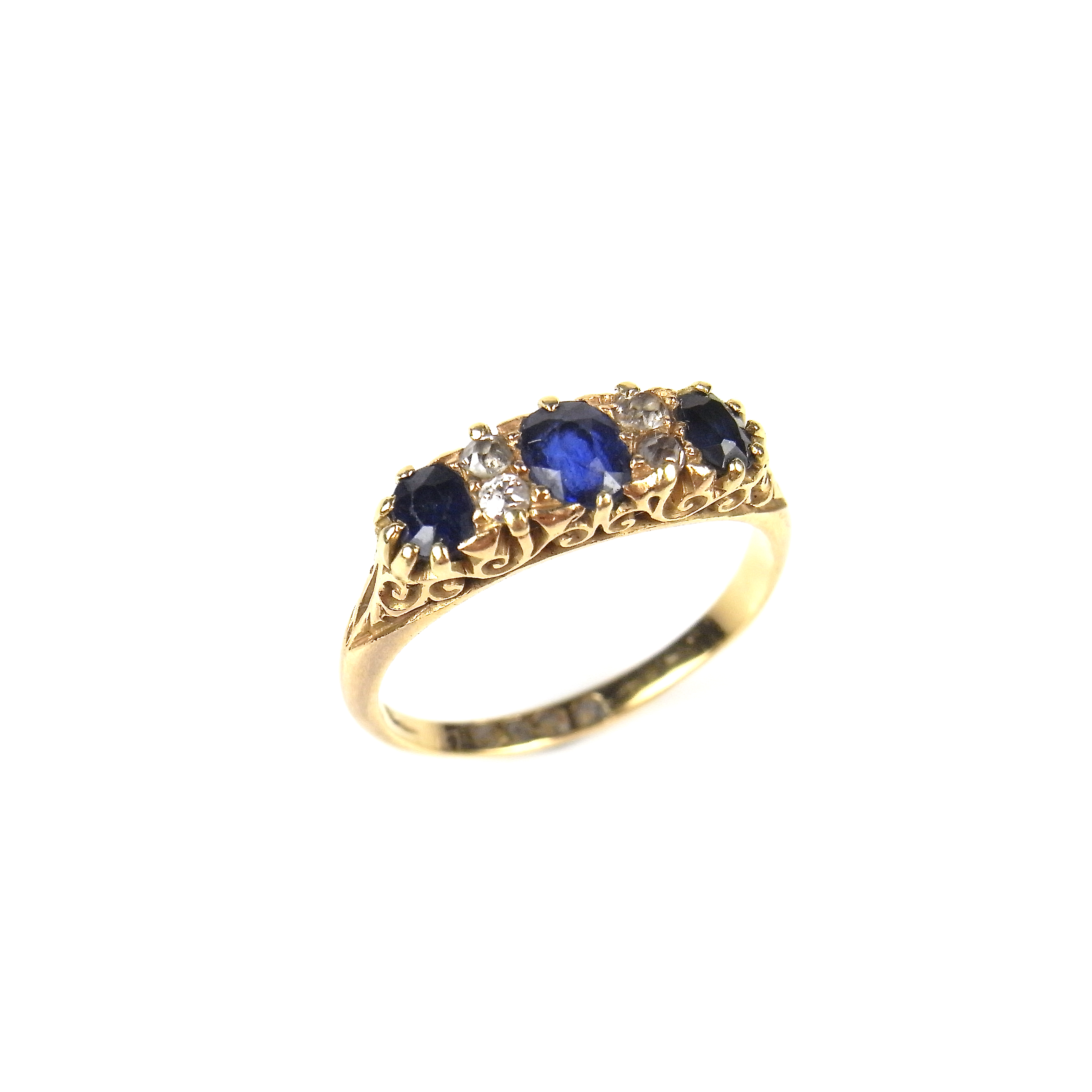 18 ct yellow gold sapphire and diamond three stone ring.