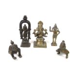 A collection of Indian bronze and brass Hindu deity figures.