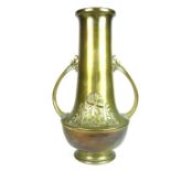 An Art Nouveau brass twin handled vase, early 20th century.