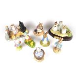 A collection of eight John Beswick Beatrix Potter ceramic figurines.