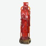 A large Chinese carved bakelite figure, early 20th century.