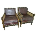 A pair of Victorian carved oak chairs