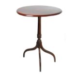 An Edwardian mahogany occasional table.