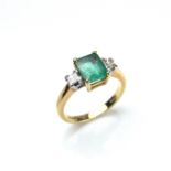 18 ct yellow gold emerald and diamond ring.