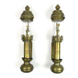 A pair of brass railway train carriage oil lamps.