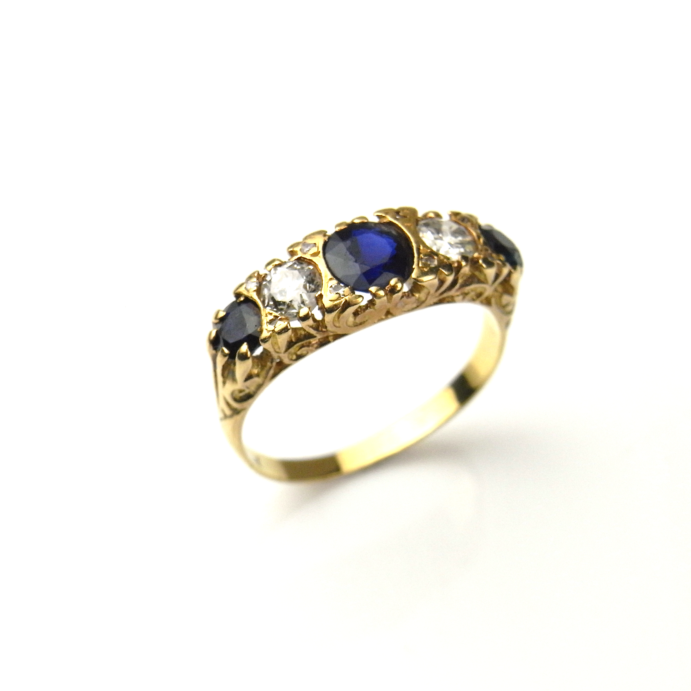 18 ct yellow gold sapphire and diamond five stone ring.