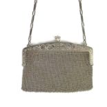 A French ladies silver chain mail evening clutch bag, early 20th century.