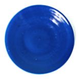 A Chinese blue monochrome glazed dish, 19th century
