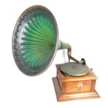 A Chas T Robey oak cased gramophone with a green horn, early 20th century