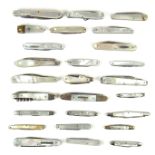 A collection of mother of pearl pen knives and a cigar cutter