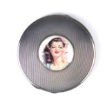 Two women's silver makeup powder compacts