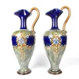 A pair of Royal Doulton vases