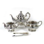 A William IV Irish silver three piece tea service and pair of sugar tongs.