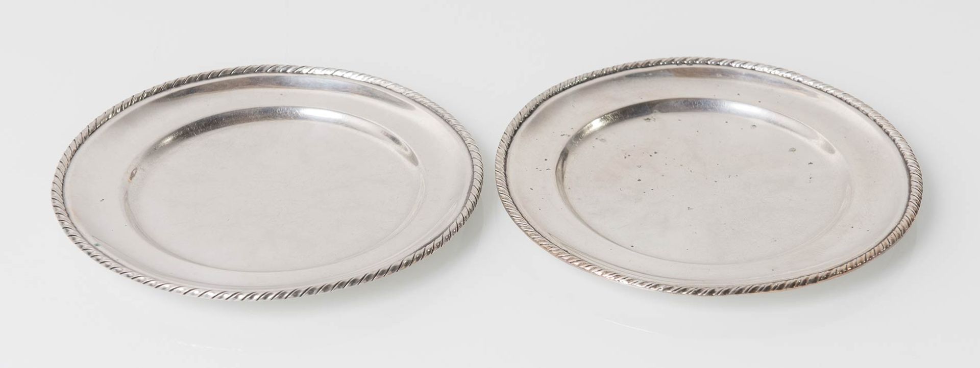 Coppia di patti da pane in argento, Alessandria – Anni ‘30.