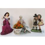 A Dakon figure of Austrian children, a Lladro figure of a man in 18th Century dress and a