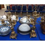 A pair of gilded metal candelabras Condition Report: Available upon request