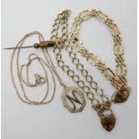 A 9ct gold chain with a 'N' pendant length 46cm, a 9ct gold fancy link gate bracelet with heart