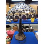 A Tiffany style leaded and stained glass table lamp Condition Report: Available upon request